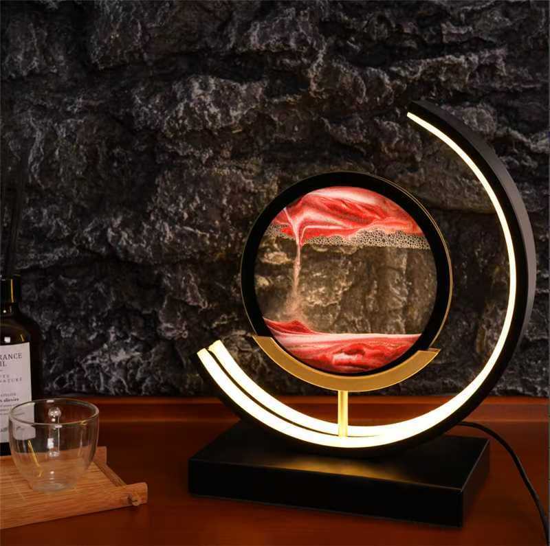 Glass hourglass table lamp