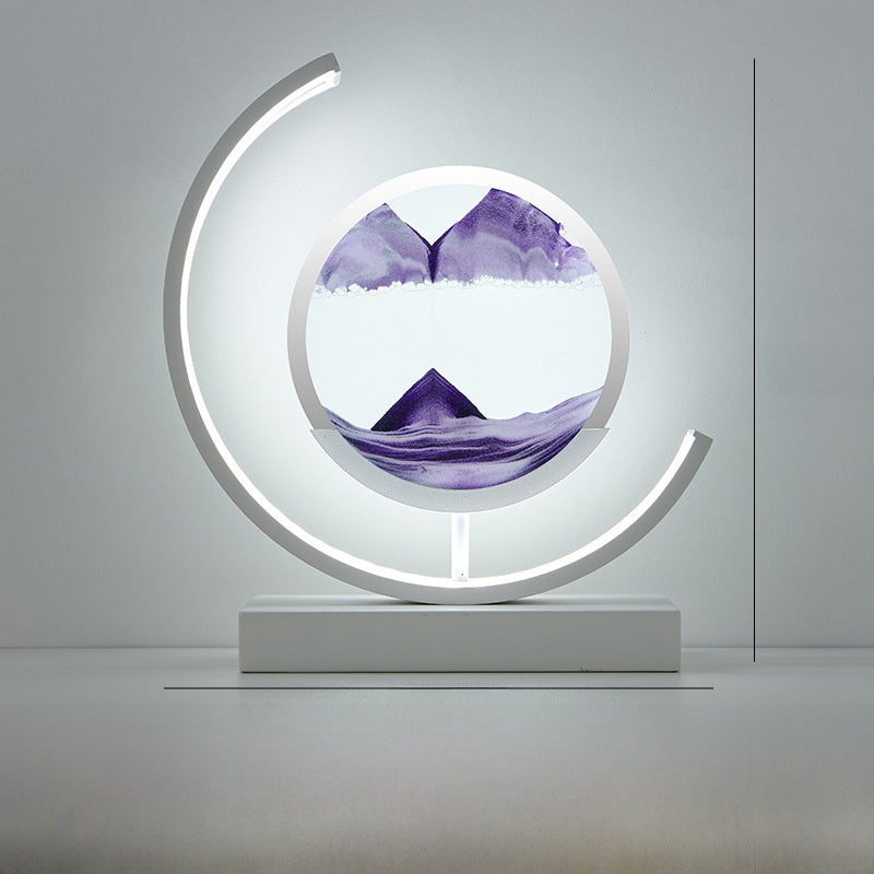 Glass hourglass table lamp