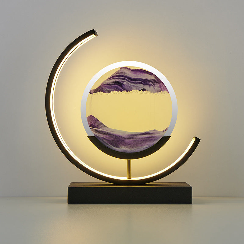 Glass hourglass table lamp