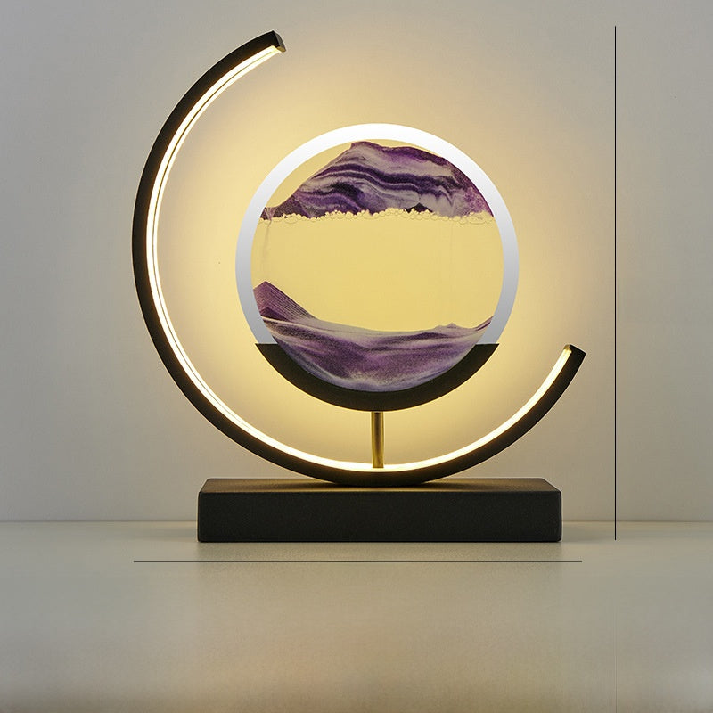 Glass hourglass table lamp